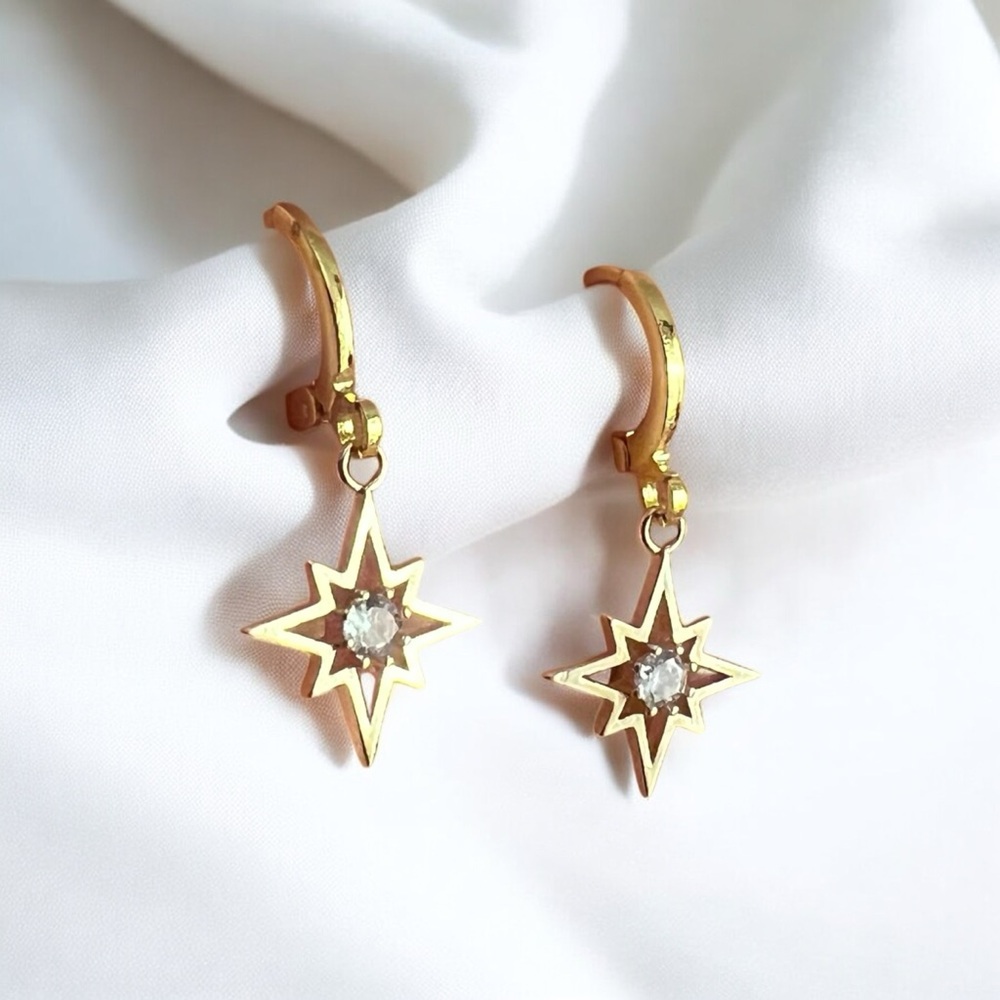 gold starburst huggie hoop earrings